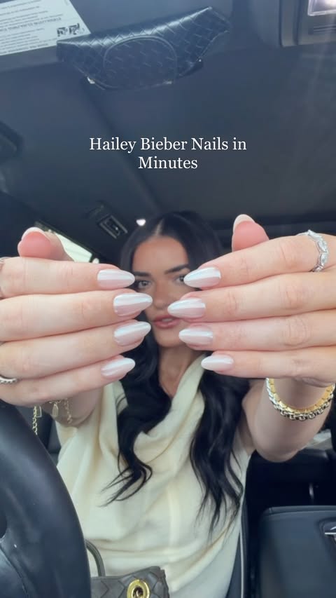 Instagram post by @ravennicolegates for ohora. Caption reads: [...] Bieber inspired nails brought to you by....