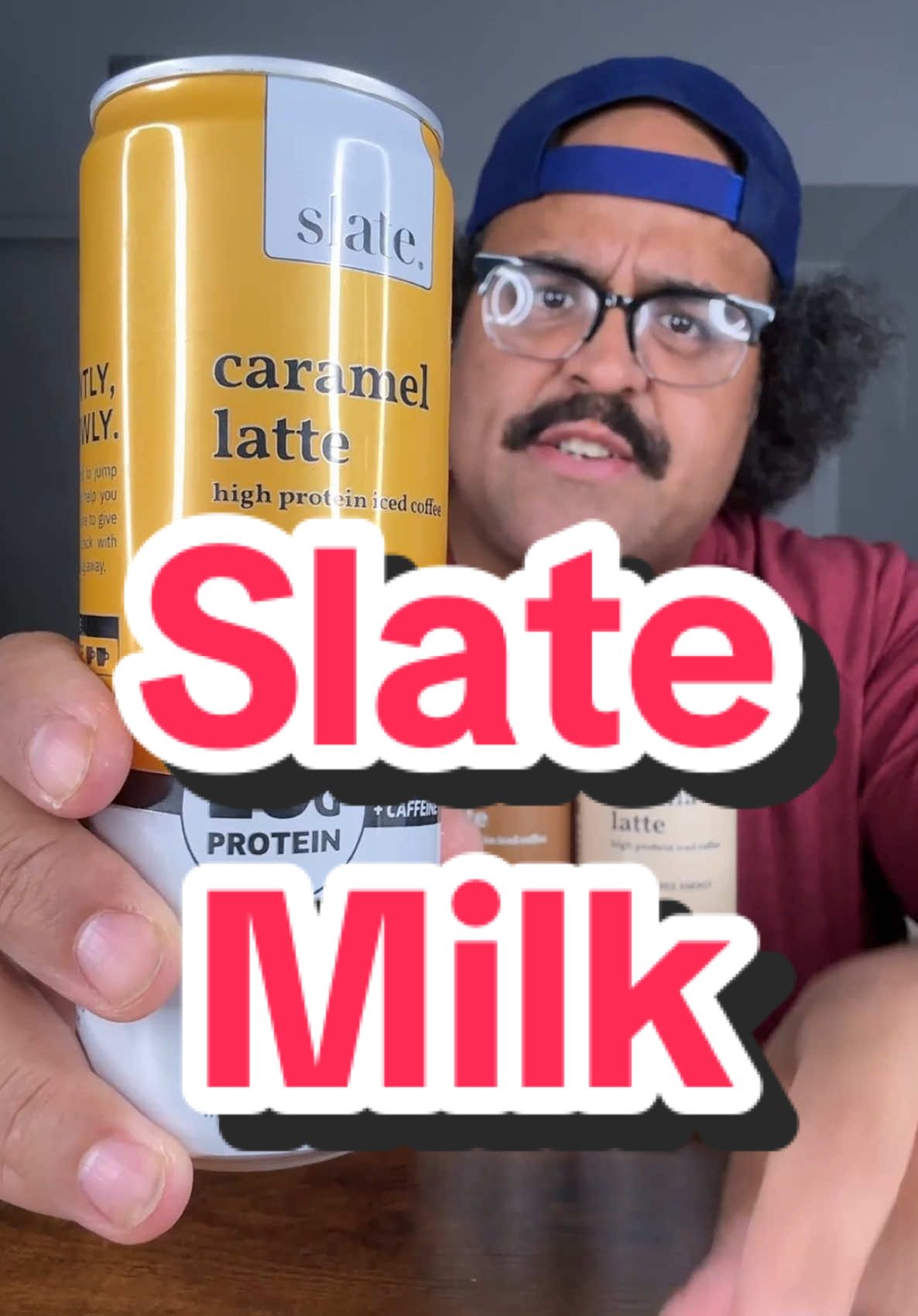 TikTok post by @thomas.ruster for Slate Milk. Caption reads: This High Protein Iced Coffee from @Slate Milk is....