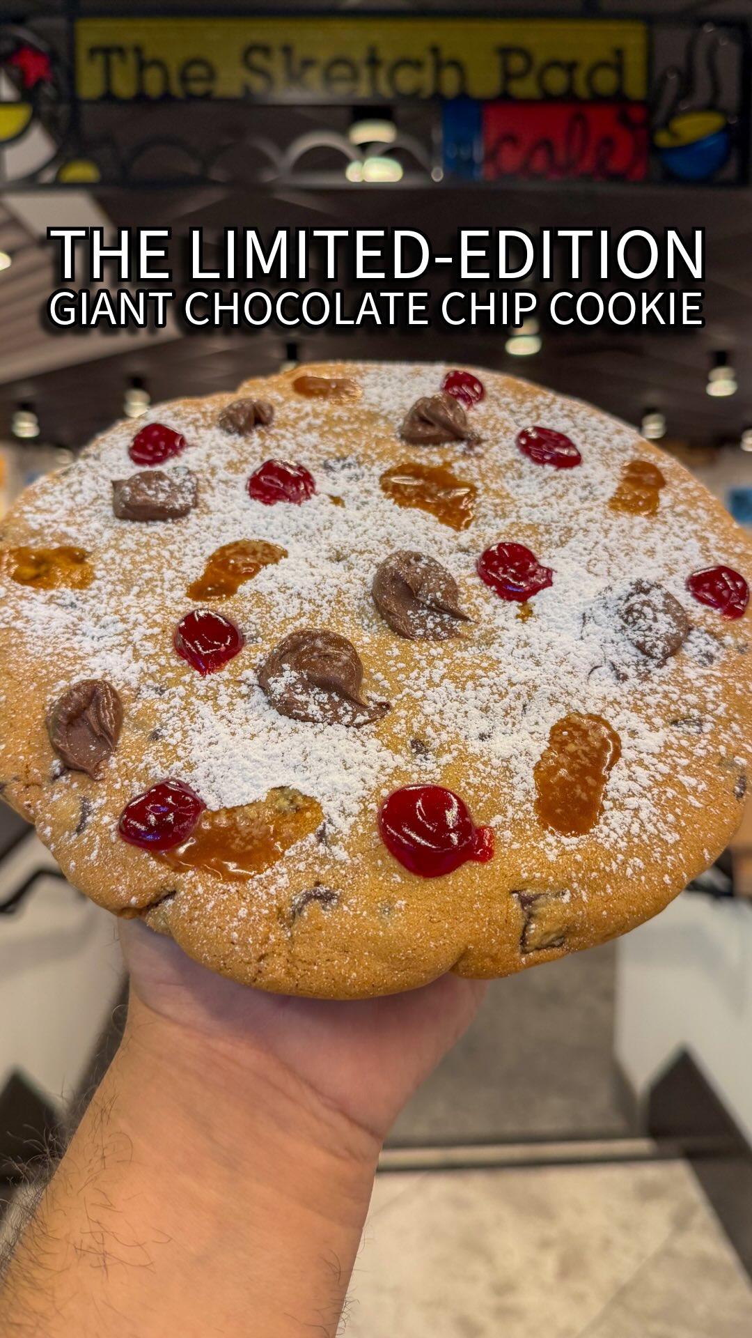 Instagram post by @foodatdisneyland for Disneyland. Caption reads: The Limited-Edition Giant Chocolate Chip Cookie....