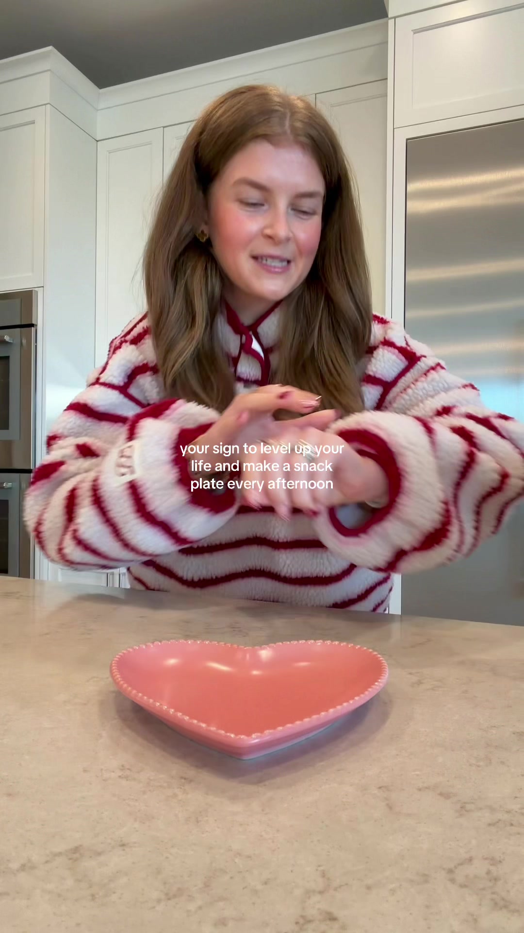 TikTok post by @allieappleton for Hu Kitchen. Caption reads: ideal valentine’s day treat: @hukitchen dark....