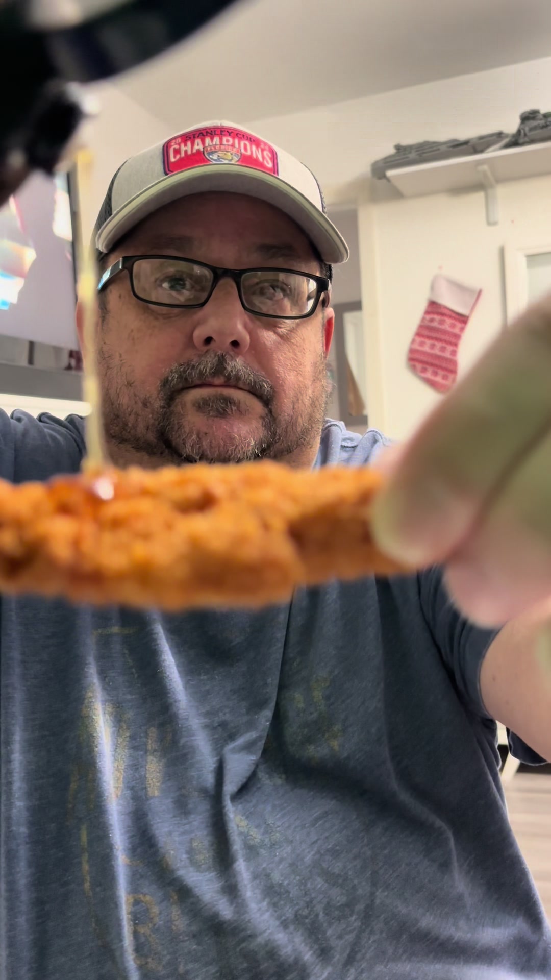 TikTok post by @gangsta_gramps for Elijah's Xtreme. Caption reads: @Elijah’s Xtreme Hot Sauce #giftguide #holidays....