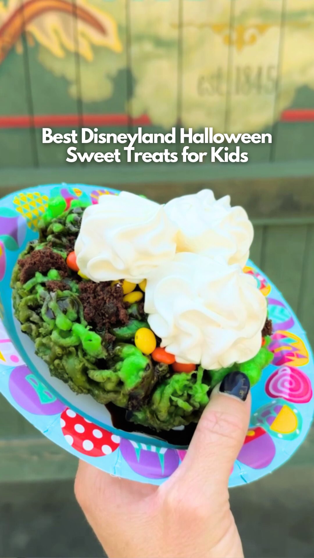 Instagram post by @mickeyvisit for Visit Anaheim. Caption reads: 🍭These spooky Disneyland Halloween Time treats....