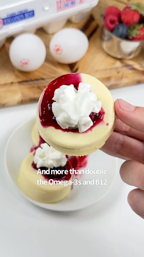 Instagram post by @ketosnackz for Eggland's Best. Caption reads: [...] High Protein Mini Cheesecakes with....