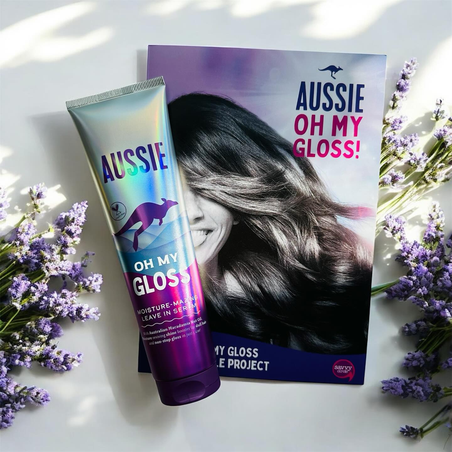 Instagram post by @abajkaaaa_producttester for SuperSavvyMe. Caption reads: Aussie Oh My Gloss Leave-In Serum

🟣Very nice....