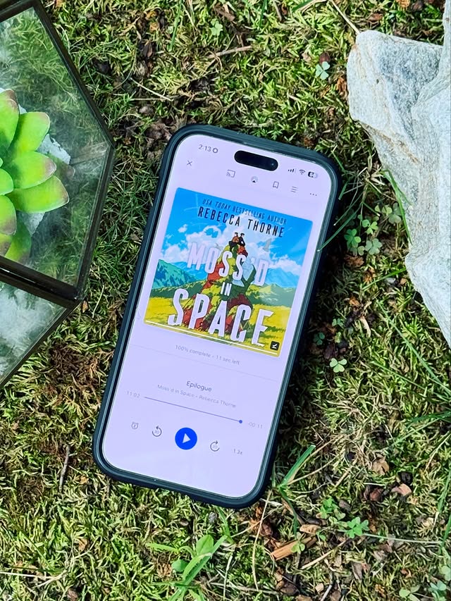 Instagram post by @novels_and_daydreams for Macmillan Audio. Caption reads: 🎧 Ａｕｄｉｏｂｏｏｋ Ｒｅｖｉｅｗ 🎧 📗 𝕄𝕠𝕤𝕤’𝕕 𝕚𝕟....