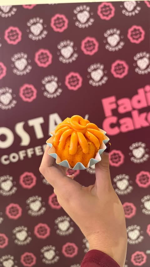 Instagram post by @heloise.confidence for Costa Coffee. Caption reads: ✨ Costa Coffee x Fadie Cakes: A Limited-Edition....
