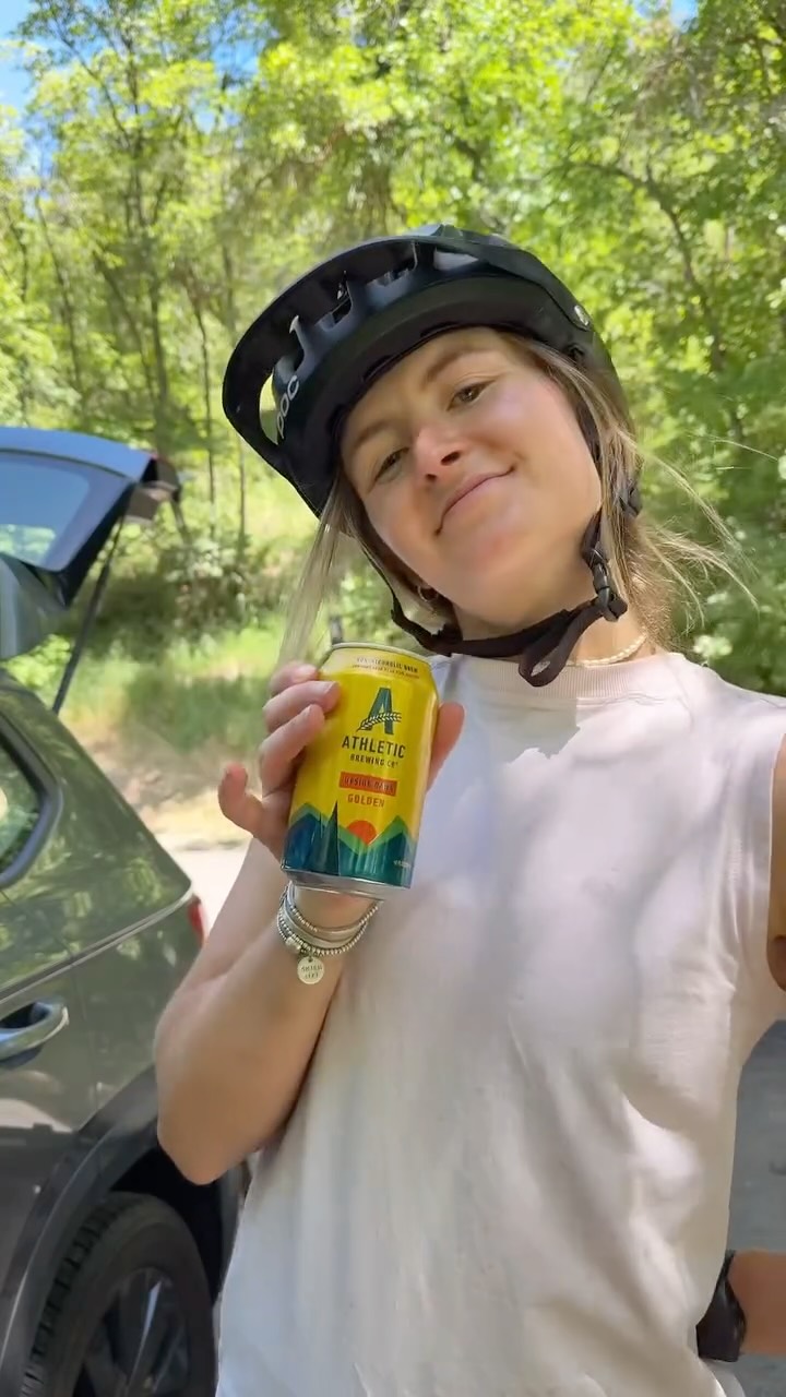 Instagram post by @hannah_melinn for Athletic Brewing. Caption reads: There is nothing I love more than long summer days....