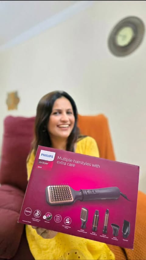 Instagram post by @neetamundraa for Amazon AE. Caption reads: “Leveling up my hair game with the 
PHILIPS 5 in 1....