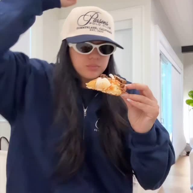 Instagram post by @mrsremiashten for Domino's. Caption reads: post wedding plans are laying on the couch and....