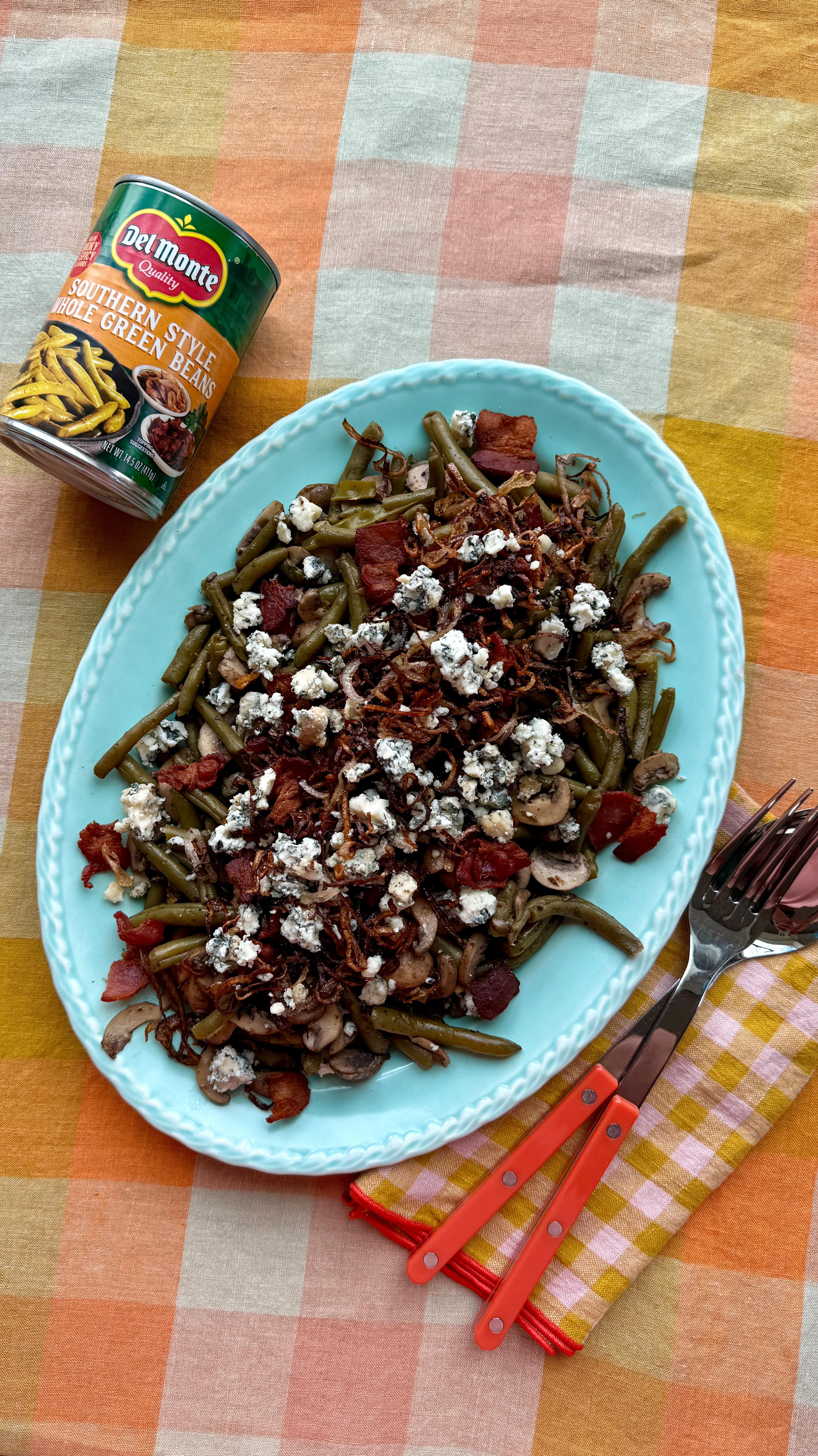 Instagram post by @grossypelosi for Del Monte. Caption reads: Put a twist on a classic holiday side dish in....