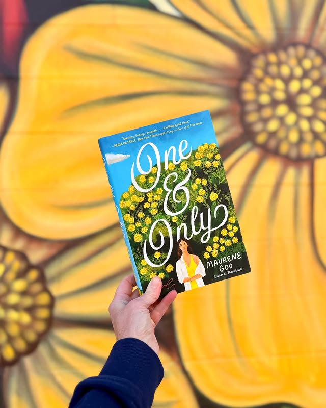 Instagram post by @suethebookie for Putnam Books. Caption reads: Have you ever been in a love triangle? Okay,....