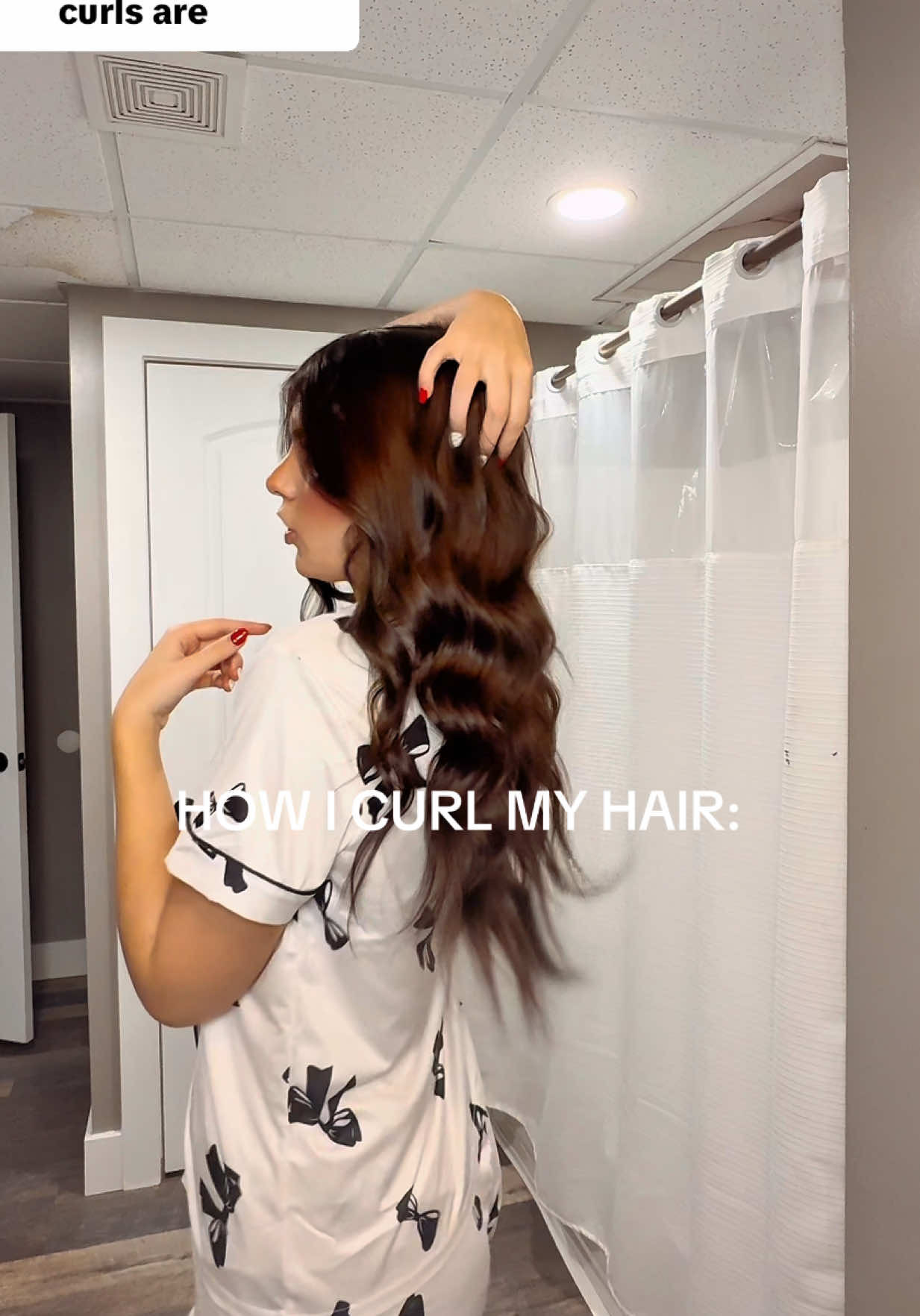 TikTok post by @kambreewhite for Bio Ionic. Caption reads: [...] shut up about this curling iron 🙌🙌 @Bio....