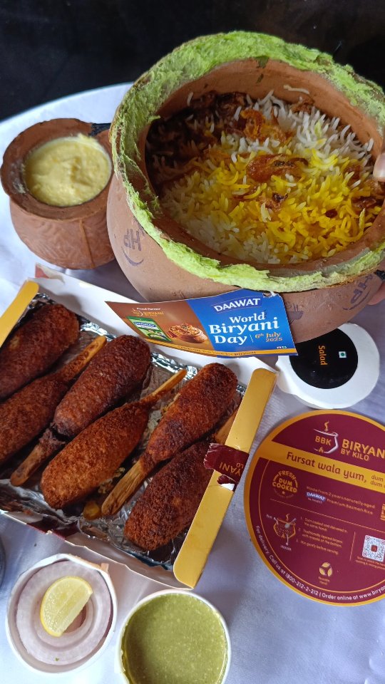 Instagram post by @yummy____foodie for Biryani By Kilo. Caption reads: [...] 👑🍚 Happy World Biryani Day from Biryani by....