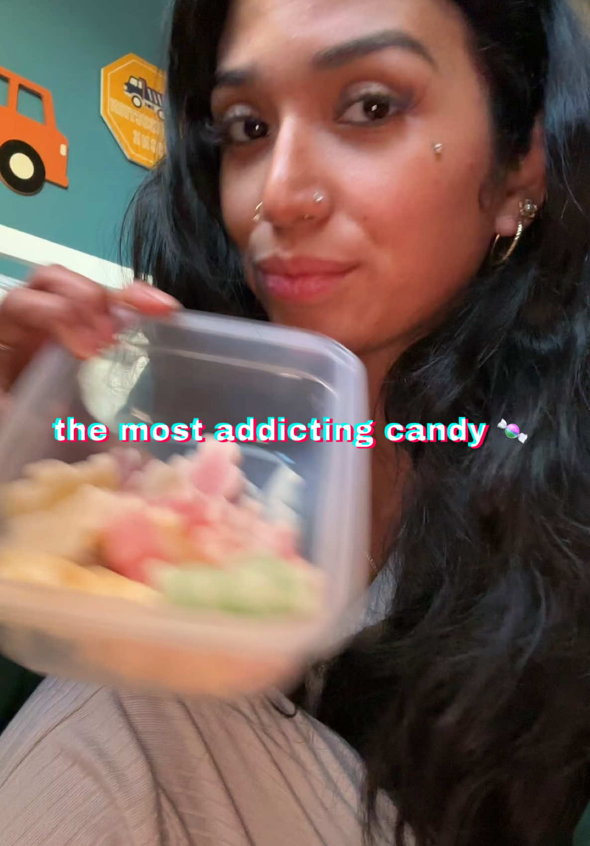 TikTok post by an influencer for CandyJoy. Caption reads: [...] more nowww, I’m outttt 😩 @CandyJoy US....