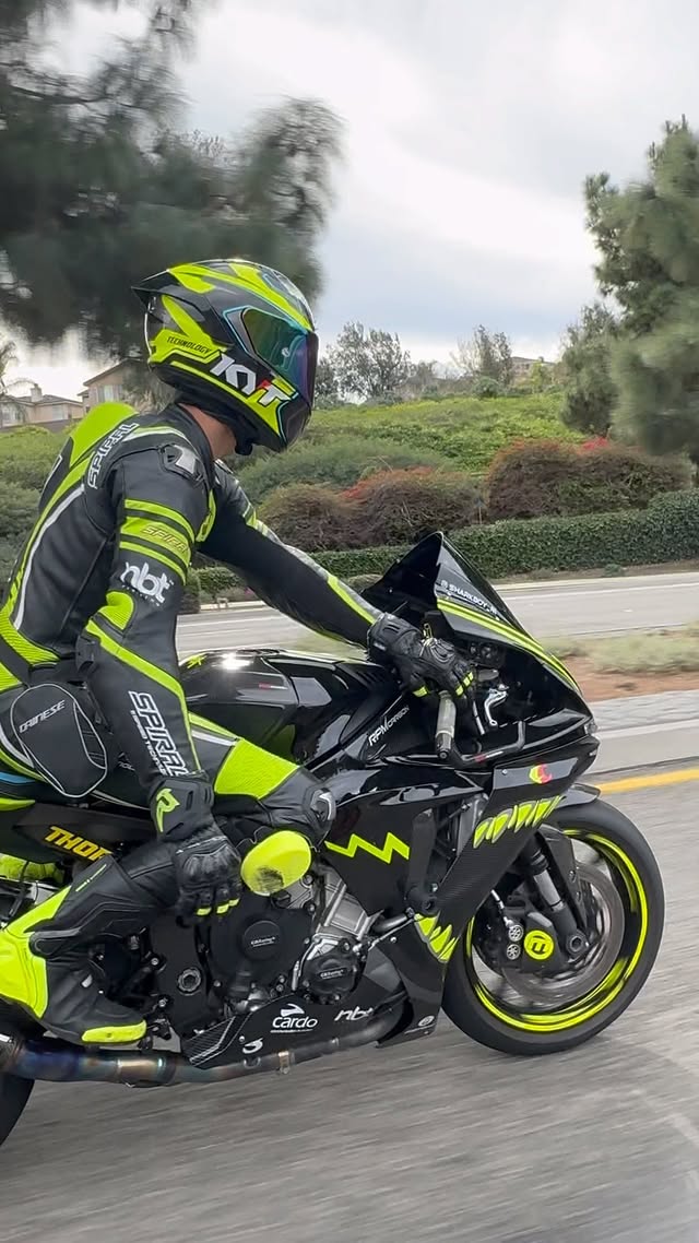 Instagram post by @sharkboy_r1 for KYT Americas. Caption reads: [...] @ravenmoto @luimoto @themotocoach....