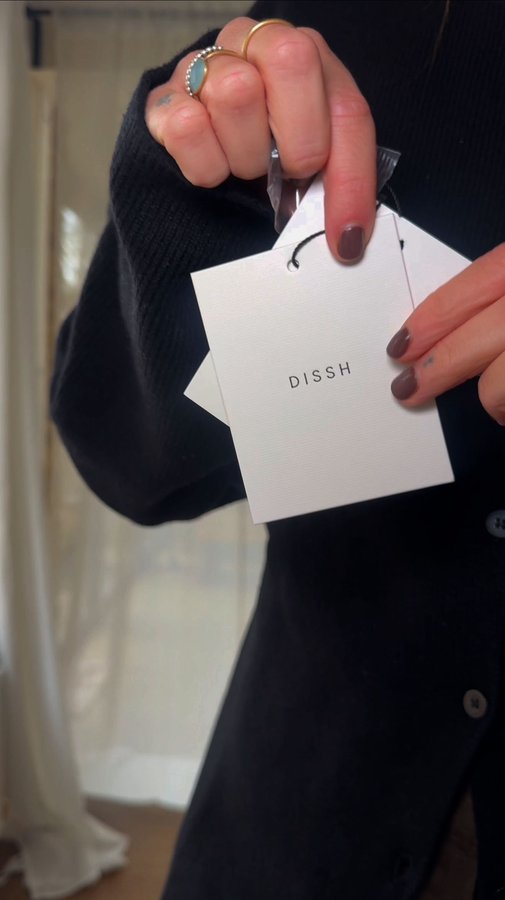 Instagram post by @keely_busby for DISSH. Caption reads: Can someone invite me somewhere, so I can wear....