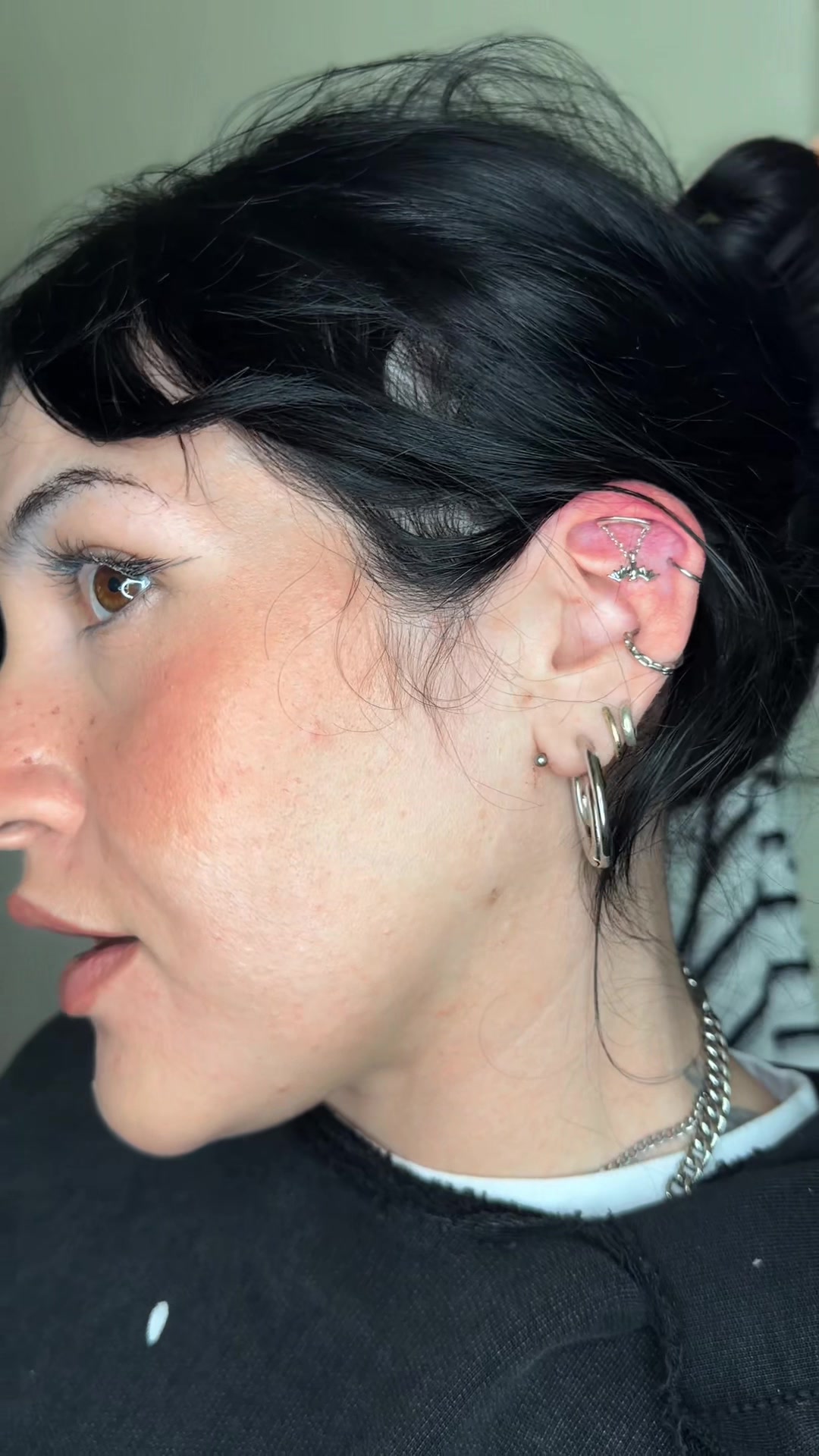 TikTok post by @andie.lee123 for Oufer Body Jewelry Official. Caption reads: Updating my earring stack with @OUFER BODY JEWELRY....