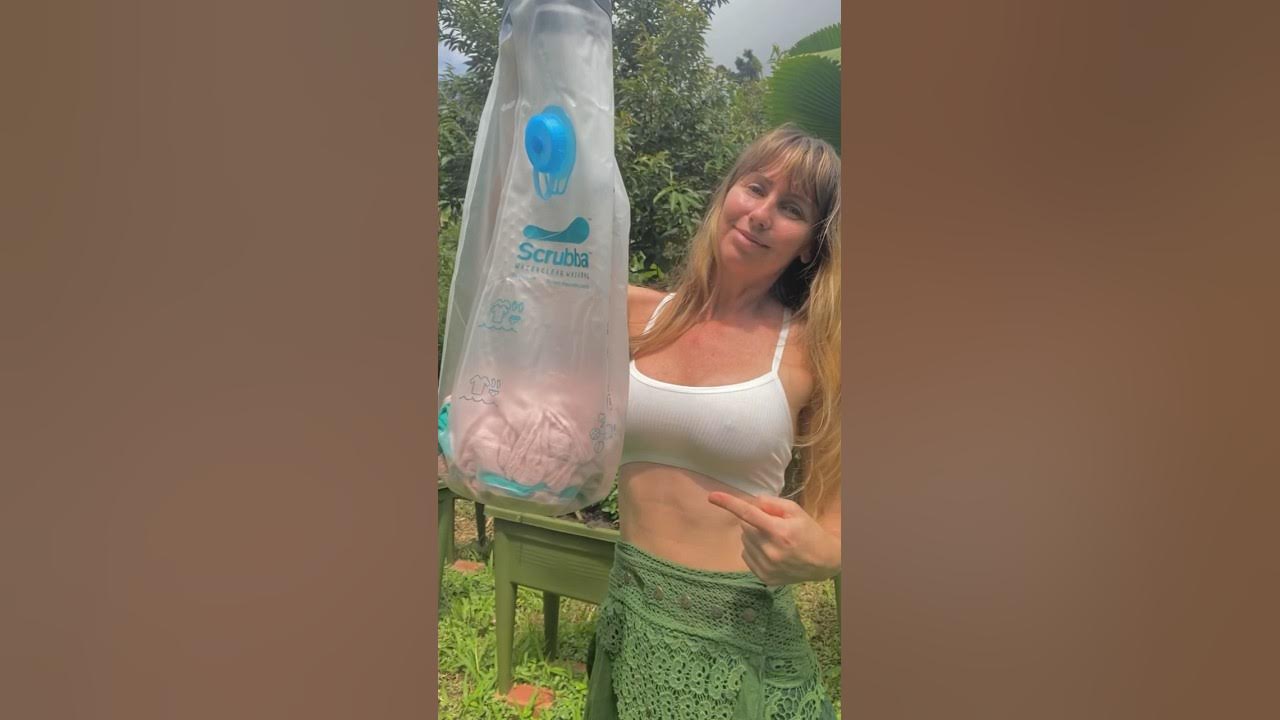 YouTube post by @freeleeTheBananaGirl for The Scrubba. Caption reads: How I wash my clothing #offgrid in the Australian....