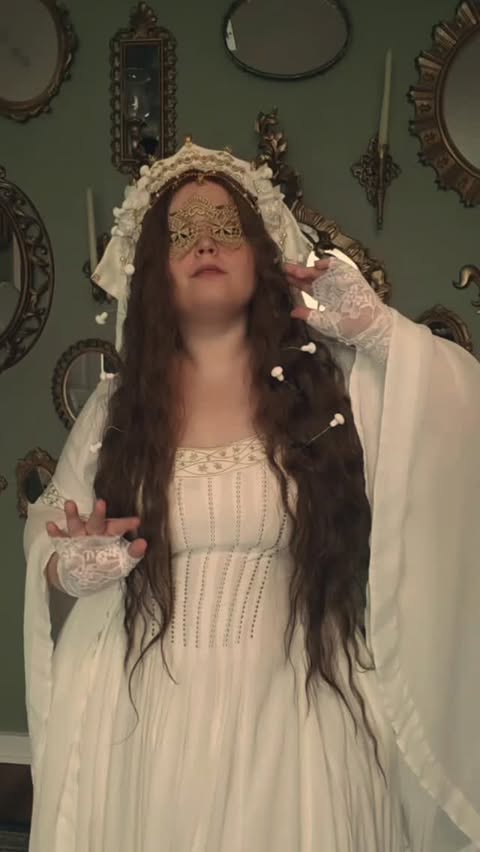 Instagram post by @burntthewaffles for HolyClothing. Caption reads: Auriel had fallen from the gates of Heaven into an....