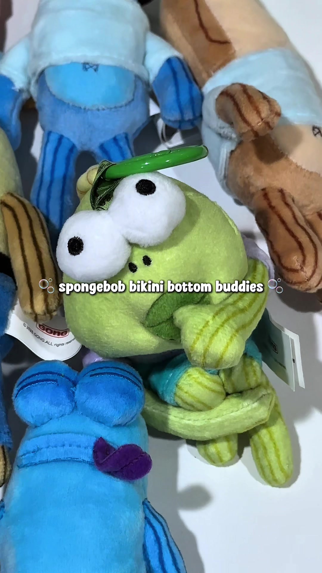 TikTok post by @joceluce for SpongeBob SquarePants. Caption reads: unboxmas day 3 | bikini bottom buddies from....