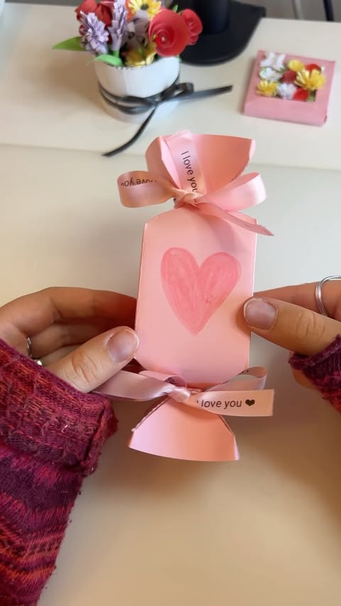 Instagram post by @lola.malins for Phomemo. Caption reads: [...] DIY cute paper candy packaging with....