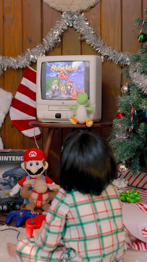 Instagram post by @aww.sam for Nintendo. Caption reads: It was 1997 and I asked Santa for an N64 and Mario....