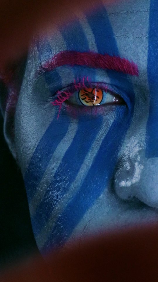 Instagram post by @rj_hooks for UNIQSO. Caption reads: Hakuji's ocean eyes 🌊🌊 Akaza makeup by....