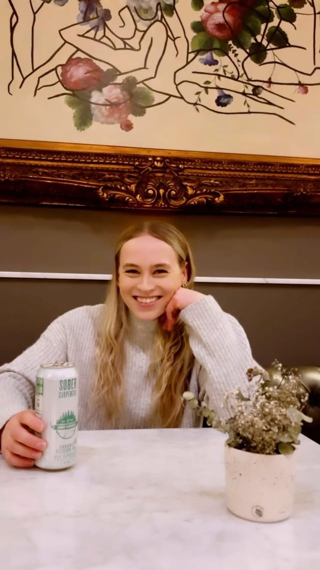 Instagram post by @ellieblack_ for Sober Carpenter. Caption reads: Why do you drink @sobercarpenter? I just do! 🤣....