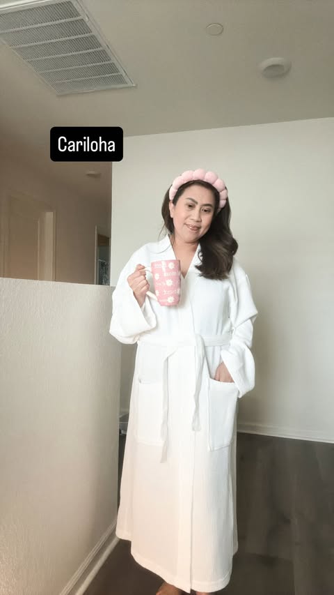 Instagram post by @simplypetiteray for Cariloha. Caption reads: [...] It’s “just a robe”… but it’s not. The....