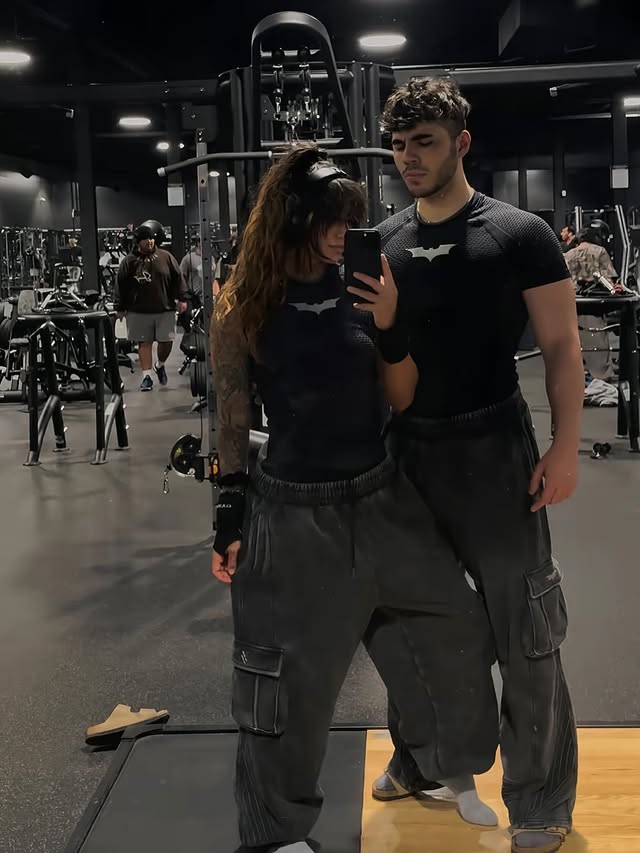 Instagram post by @dumbbellslicey for YoungLA. Caption reads: [...] code: SLICEY to revive a cat and save money....