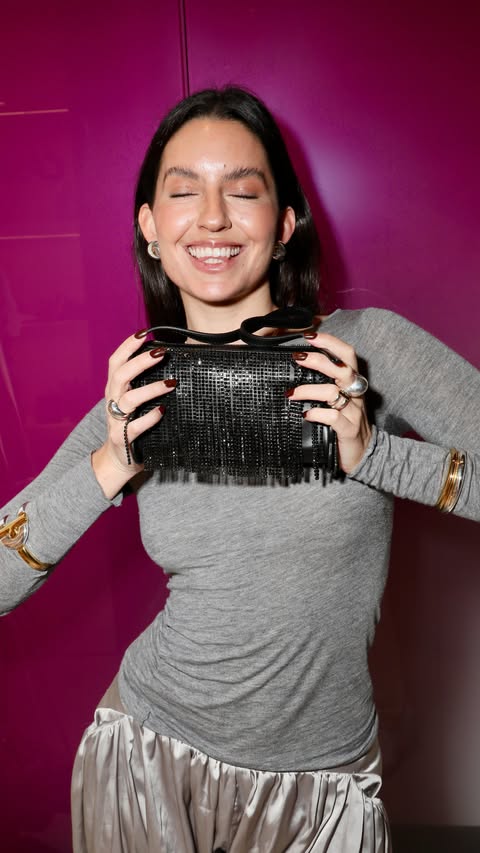 Instagram post by @andreagandrom for TOUS. Caption reads: [...] estaba peligrosamente bueno 🍸

CASATOUS....