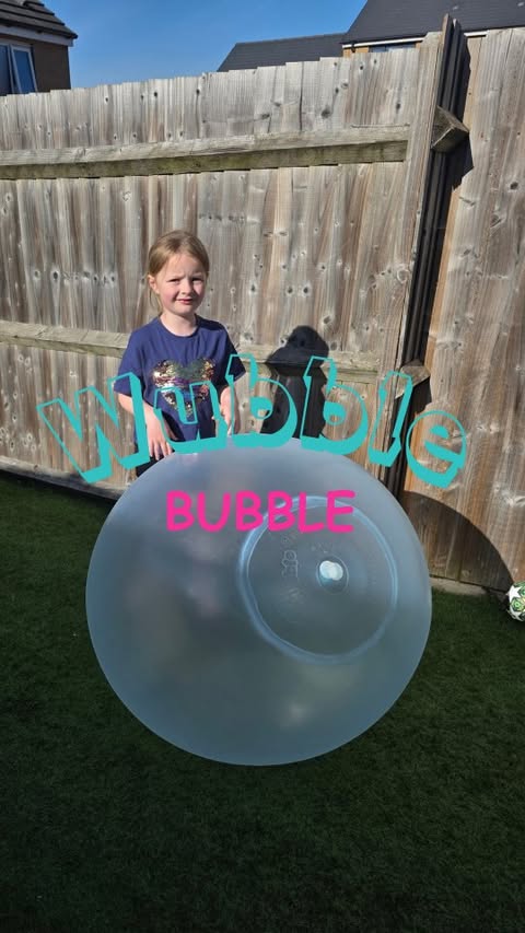 Instagram post by @thewoodwardsworld_ for The Entertainer Toys. Caption reads: Gift| The amazing Wubble Bubble Ball is unlike....