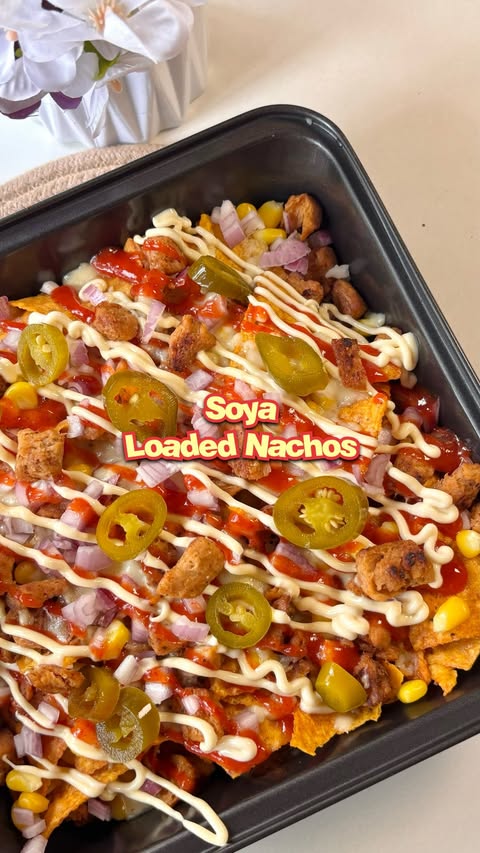 Instagram post by @polosjunkjournal for Fortune Foods. Caption reads: Loaded Nachos made with soya chunk twist has been....