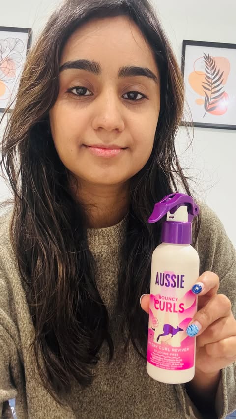Instagram post by @drcouple_2 for Aussie Hair. Caption reads: [...] bag 💼 Curls Just Wanna Have Fun 🤩....