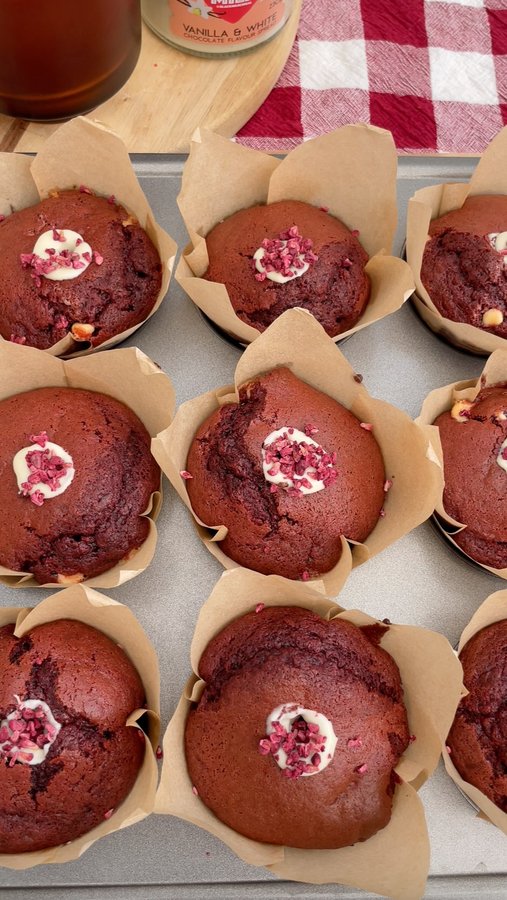 Instagram post by @sophsgoodies for Black Milk. Caption reads: Red Velvet Muffins with a white chocolate filling....