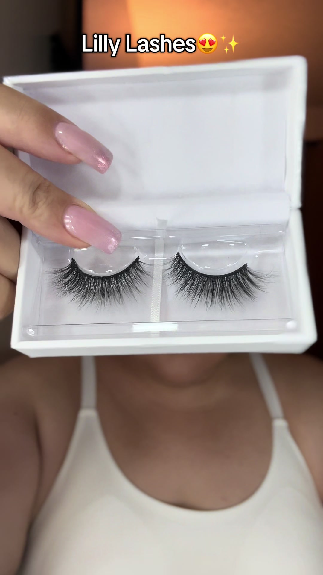 TikTok post by @lucyylovesmakeup for Lilly Lashes. Caption reads: Let’s apply these gorgeous @Lilly Lashes in the....