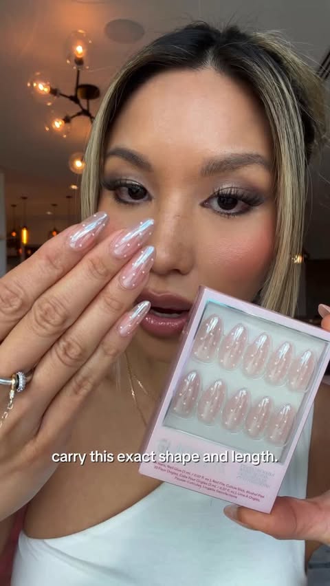 Instagram post by @themodernartista for Glamnetic. Caption reads: If you’ve noticed a mysterious glazed mani on my....