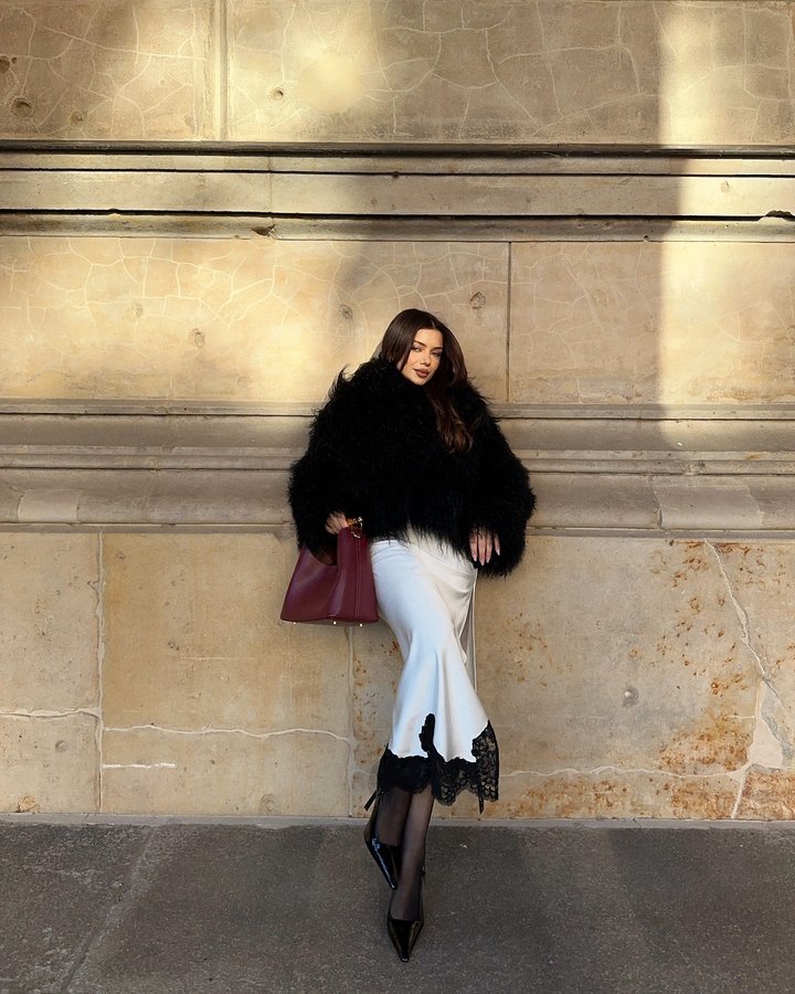 Instagram post by @michaelaberdaga for Elleme. Caption reads: [...] cardigan
@kalinkafurs jacket 
@elleme....