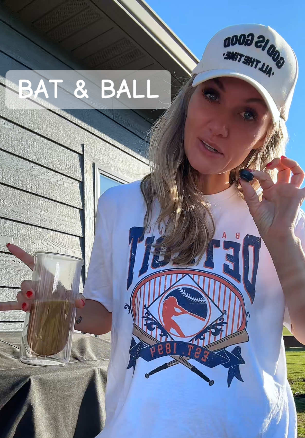 TikTok post by @mitten_state_girl for PartyOnShop. Caption reads: Let’s play ball! @PartyOnShop ! #vintagetshirt.