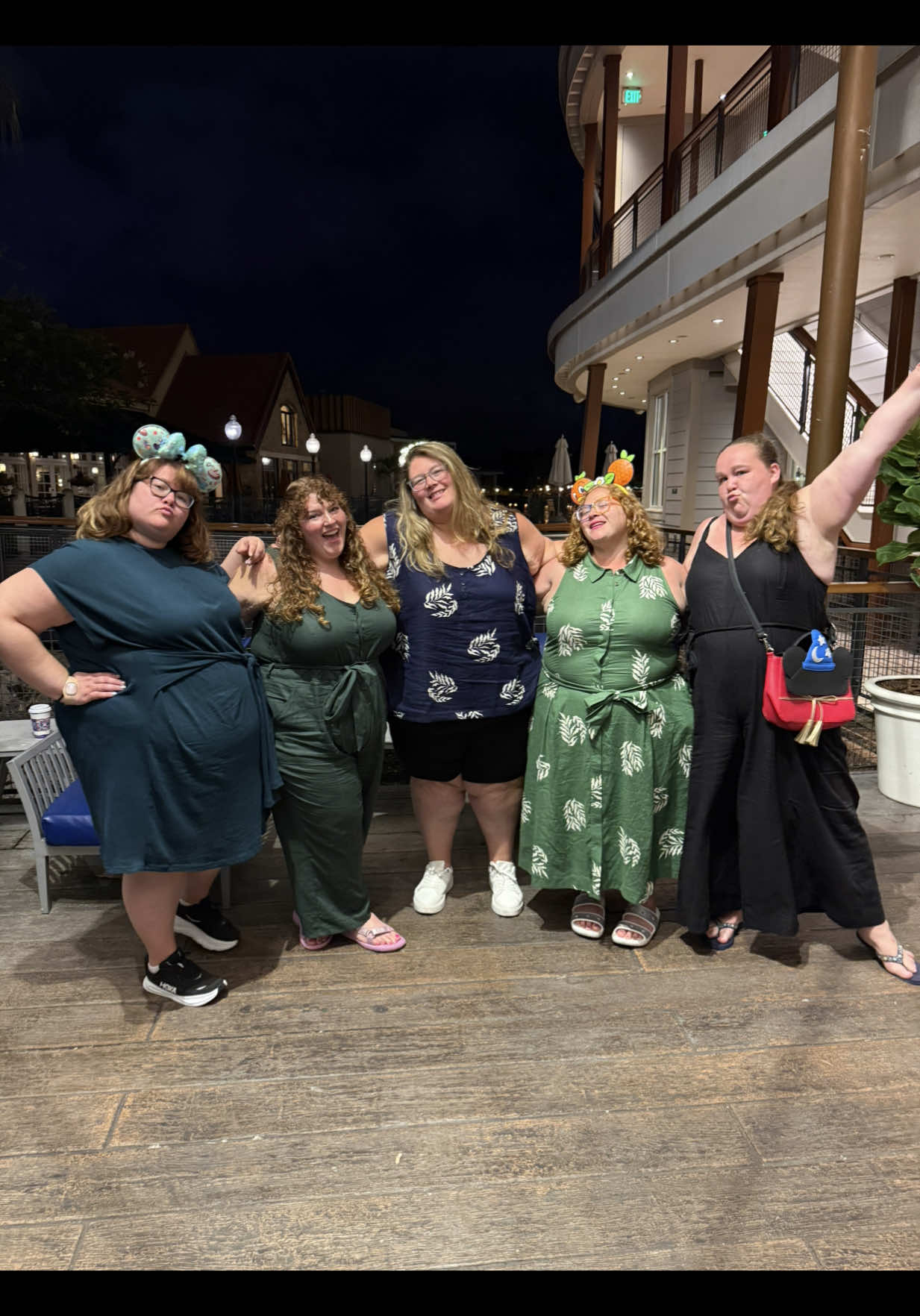 TikTok post by @plussizeparkhoppers for Universal Standard. Caption reads: 👗 This is our evening Outfit of the Day at Disney....