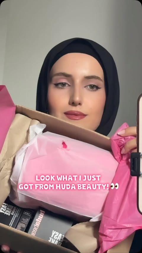 Instagram post by @aura_lifestyle27 for HUDA BEAUTY. Caption reads: A little Huda Beauty unboxing ✨🎁 So excited to....