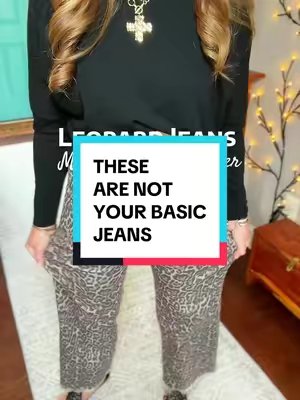 TikTok post by @the_catmarie for Shewin. Caption reads: High-waisted leopard print wide-leg jeans that....