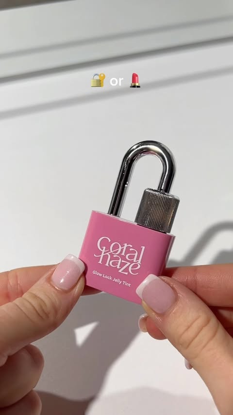 Instagram post by @_cloebeauty for Coral Haze. Caption reads: 🔐or 💄? @coralhaze_beauty glow lock jelly tint....