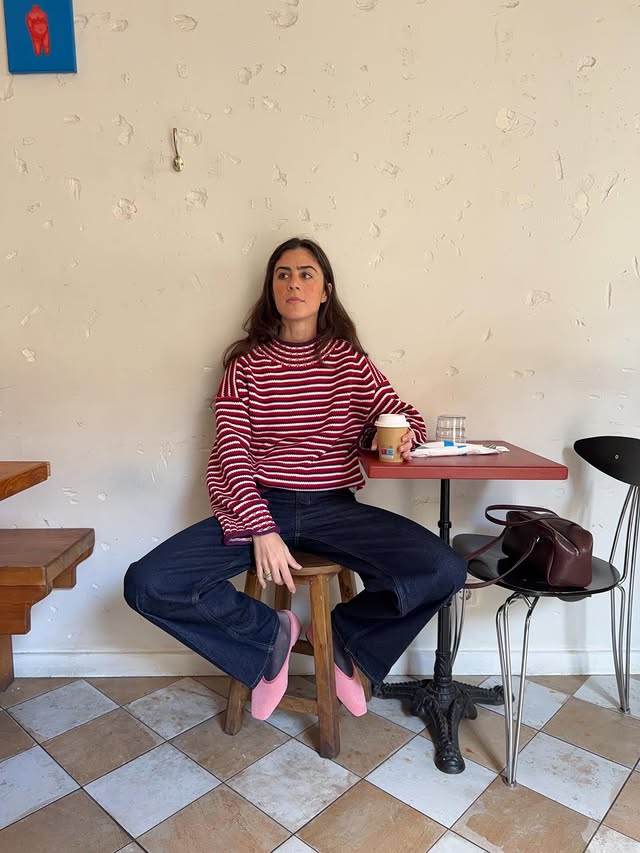 Instagram post by an influencer for J.Crew. Caption reads: ad. 24 hours at home. @jcrew new rollneck. and....