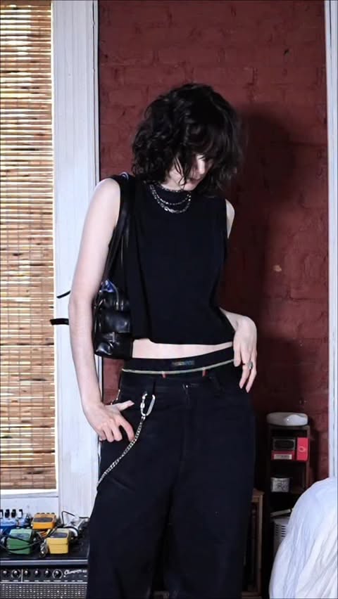 Instagram post by @irisolympia for TomboyX. Caption reads: tysm @tomboyx 🌈 use my code IRIS15 for 15% off 💞....
