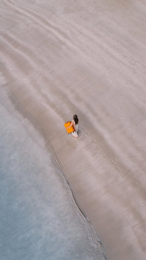 Instagram post by @reispackers for American Tourister. Caption reads: Taking our suitcase everywhere we go.. literally....