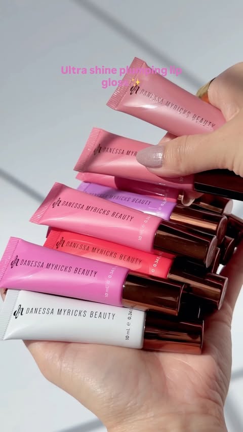 Instagram post by @fromsandyxo for Danessa Myricks Beauty. Caption reads: Plump, treat and shine with @danessamyricksbeauty....
