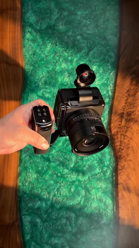 Instagram post by @kylersteele for Hasselblad. Caption reads: Unboxing Hasselblad 907X & CFV 100C Hasselblad....