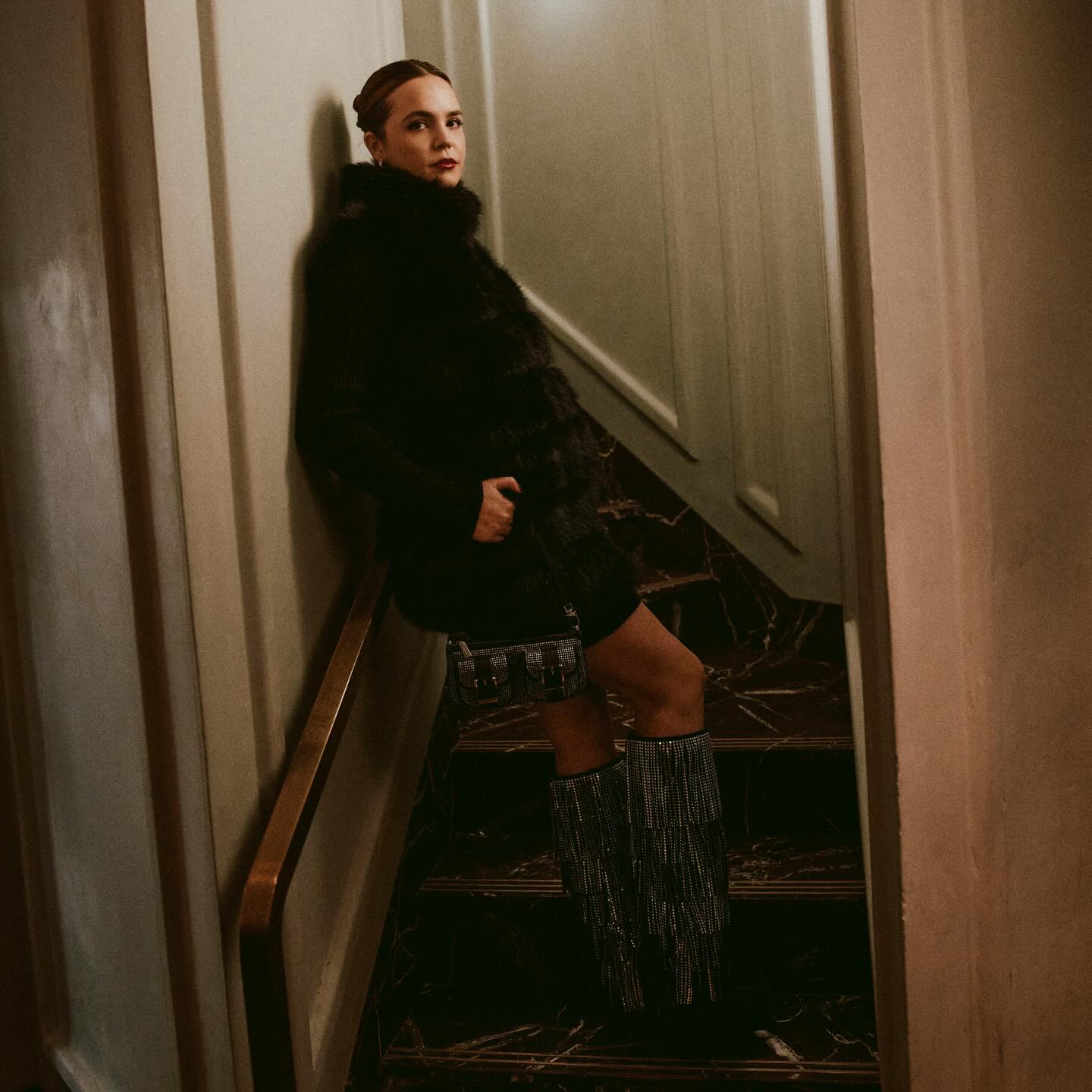 Instagram post by @baileemadison for Michael Kors. Caption reads: Ringing in my first NYC Christmas with....