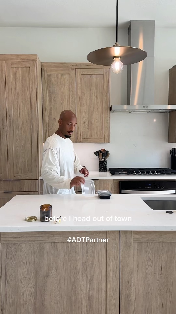 Instagram post by @carlosdharrisjr for ADT. Caption reads: #ADTPartner #ADTAd Unfortunately, a life crisis....